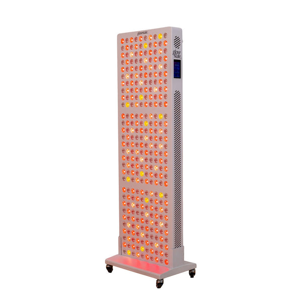 Radiance300 red light panel has 12 wavelengths, 300 LEDs, full side view glowing LEDs, white frame on stand with wheels.