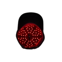 The Halo red light therapy cap showing the inside section with glowing LEDs on and background removed.
