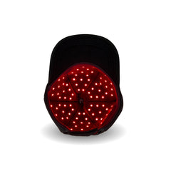 The Halo red light therapy cap showing the inside section with glowing LEDs on.