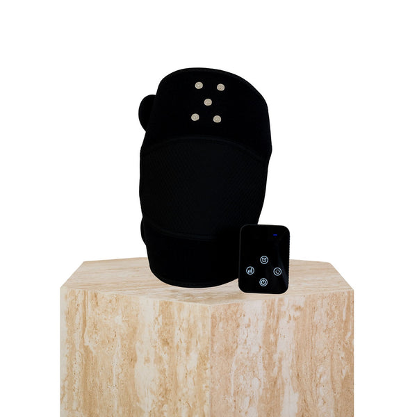 The Focus Flex Joint Wrap, a flexible red light therapy joint wrap, sitting on a plinth showing the removable control panel.