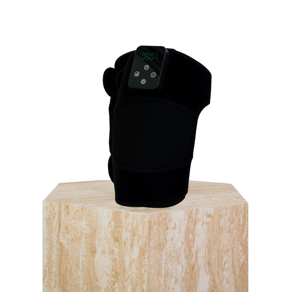 The Focus Flex Joint Wrap, a flexible red light therapy joint wrap, sitting on a plinth showing the control panel.
