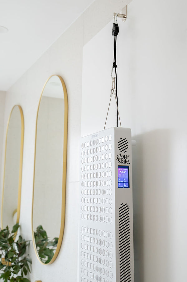The Radiance300 red light panel shown from the side view on the height adjustable door hanging kit
