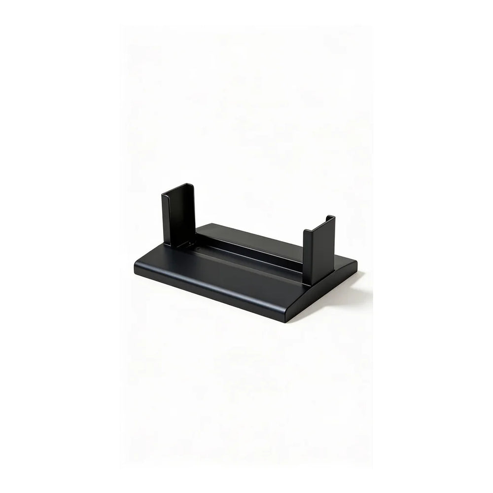 The Flow Fixed black stand side view with no wheels.